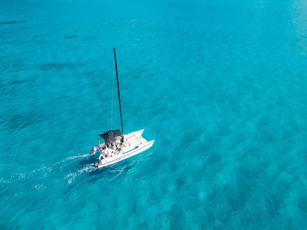 Round Trip Airport Private Tranfer and Isla Mujeres Catamaran Tour